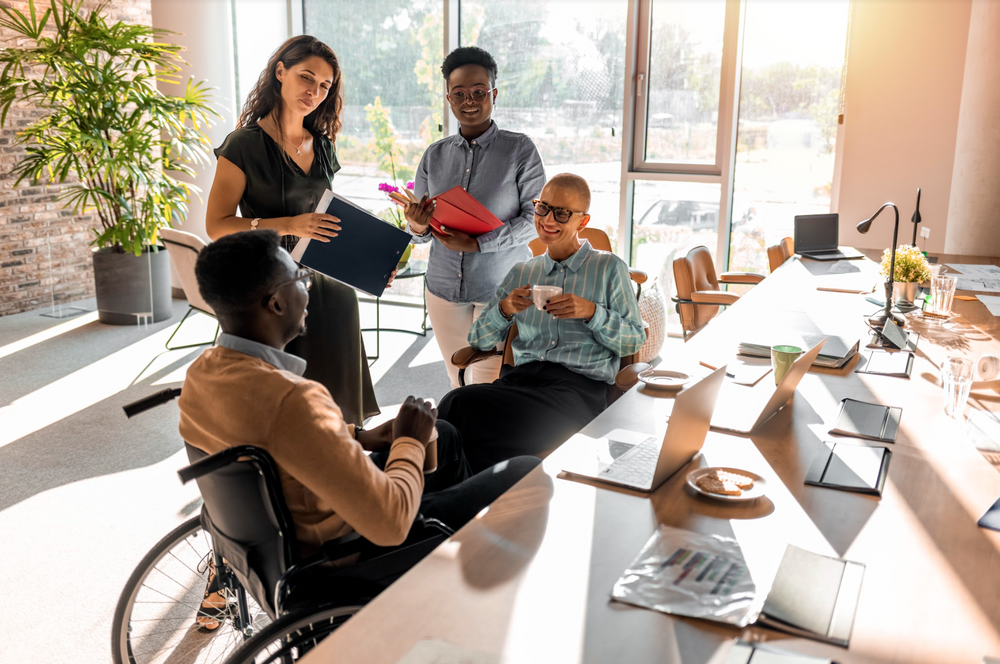 Diverse team chatting in office