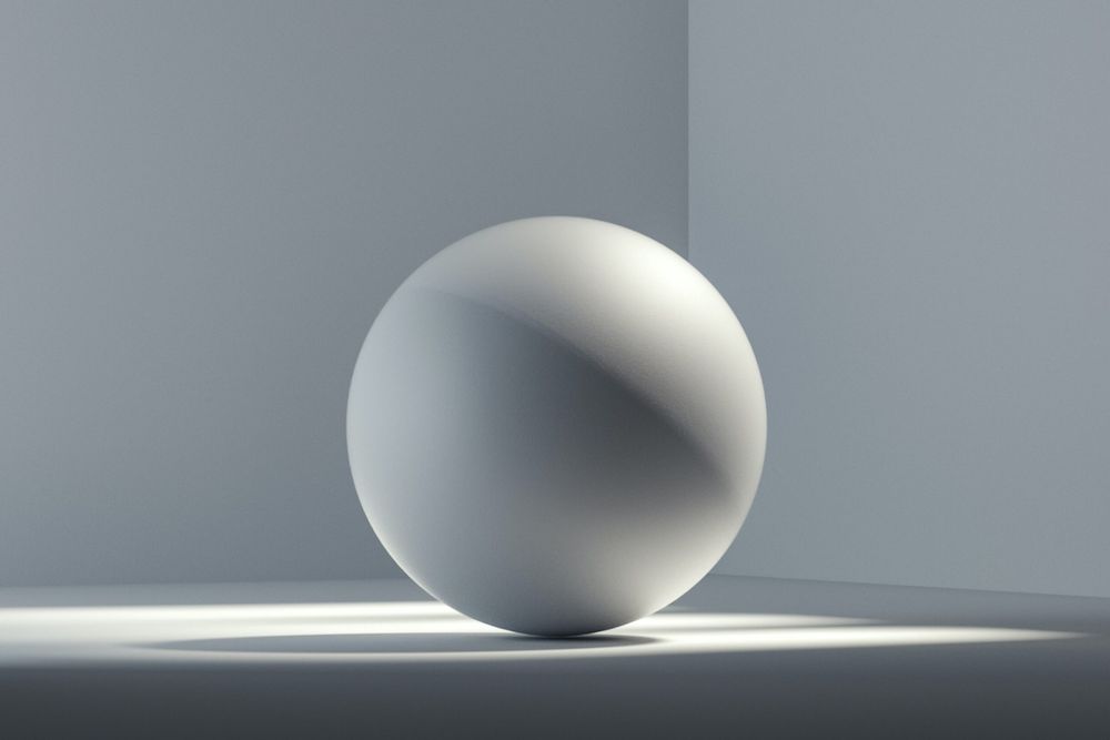 White sphere in white room with shadows