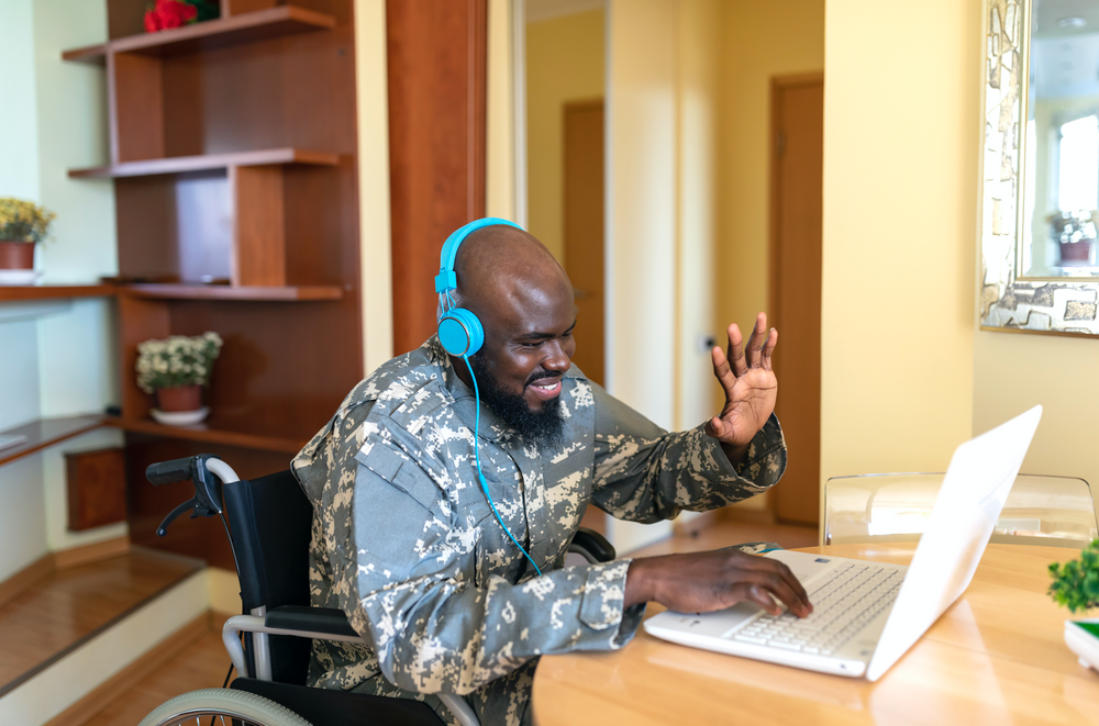 Disabled veteran working at a computer