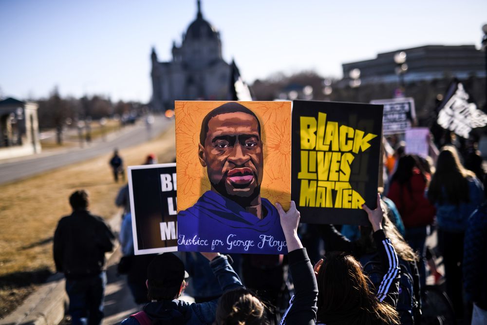 People march near the Minnesota State Capitol to honor George Floyd on March 19, 2021 in St Paul, Minnesota. 