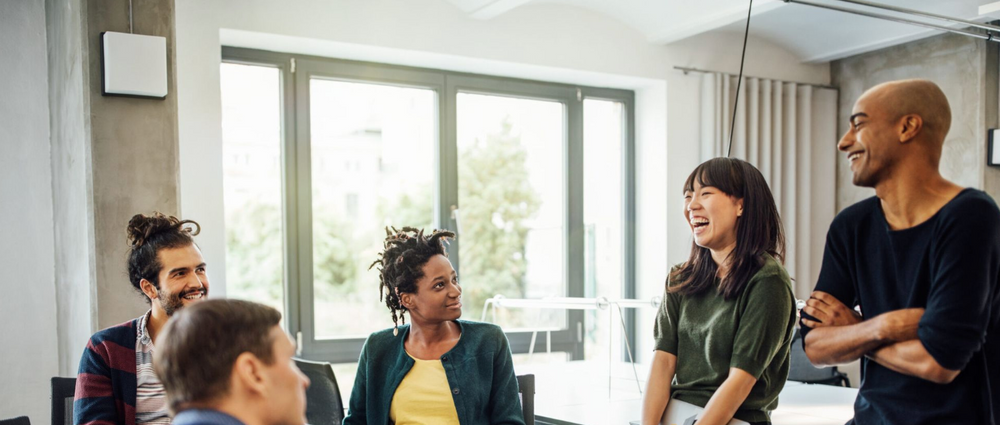 Diverse team talking in an office