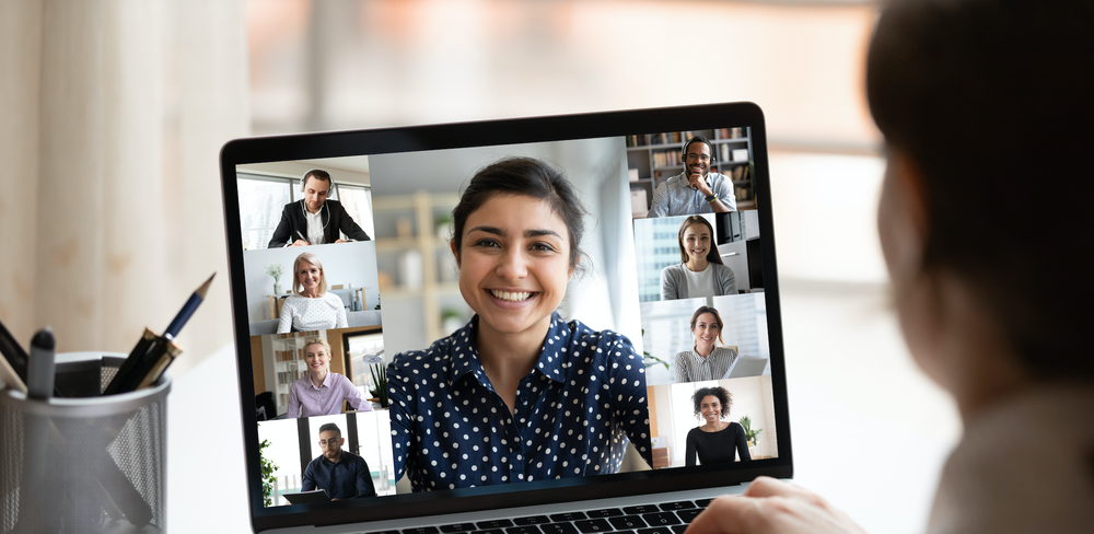 Video conference meeting screen displaying diverse professionals