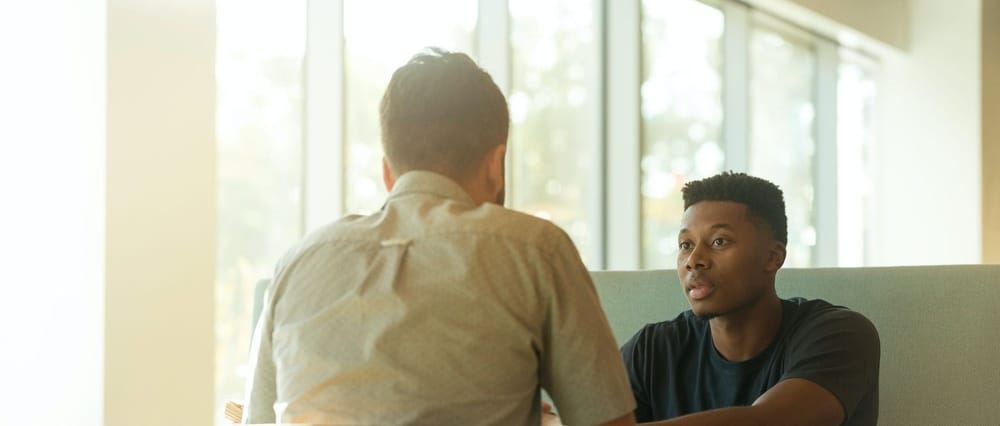 Two men having a conversation