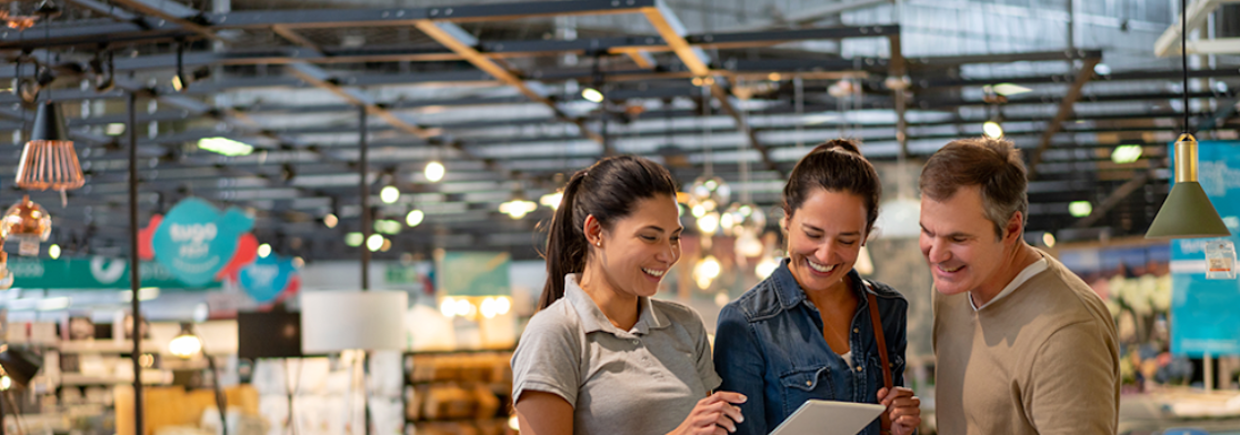 Retail worker assisting customers