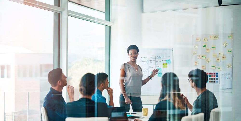 Shot of a group of businesspeople having a meeting in a modern office