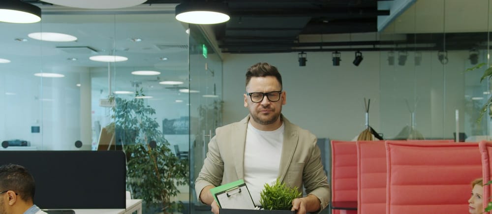 Employee takes belongings home after layoff